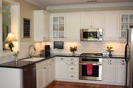white kitchen cabinets with dark