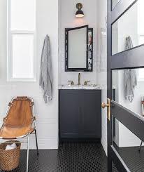 Coupled with the hexagon form of the tile these colors look the best and help make your bathroom even smarter and neater. Small Single Black Washstand With Aged Brass Contemporary Bathroom