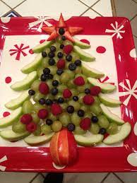 Christmas party platters made with fruit! Christmas Fruit Tree Healthy And Pretty Christmas Food Christmas Snacks Christmas Party Food