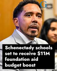 Niskayuna firefighter Matt Anderson, whose wife, Lydia, died of cancer in  November, is shown with his 19-month-old son, Leo, at a fundraiser Sunday.  Find more at DailyGazette.com or in our profile link