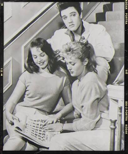 Elvis Presley, poses with his house guests, Kathy Gabriel left, and Hanneri  Melcher, in Memphis. Melcher, Miss Austria 1957, met Elvis in Las Vegas in  November 1957, and visited Graceland at Christmas
