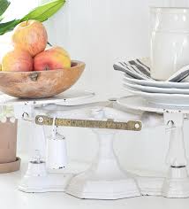 Fotor's vintage photo editor can help you enhance a picture's design texture, vibrancy, and add antique charm to any of your images easily. An Antique Balance Scale In The Kitchen