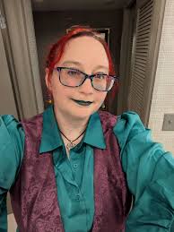 Hi all! I'm Laurel in real lifeand this Intercon I played: Destiny in  Saturday Night Gay Bar Yeva Morozov (the Rusalka) in Horizon Sutton Beale  (the one with the gun