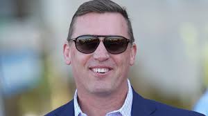 Harrison strides ahead in title race