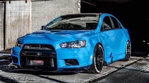 This Evo Looks Fly Wrapped In Avery Dennison Sw900 Gloss Light Blue By 253 Wrapz Https M Facebook Com 253wrapz 135813223255774 Blue Car Car Wrap Car