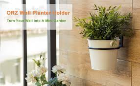 Check spelling or type a new query. Amazon Com Orz 6 Inch Wall Planter Holder Set Of 3 Pot Wall Mounted Metal Plant Hanger Collapsible Bracket Iron Black Patio Lawn Garden