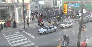 So toronto and peel you can't go to stores or restaurants? Anti Lockdown Protest Held At Yonge Dundas Square 680 News