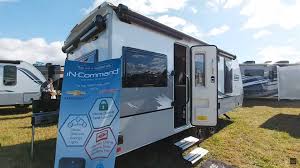 The unit sleeps up to five people between the beds and dinette. Lance Debuts Non Slideout Camping Trailer With Airstream Like Layout