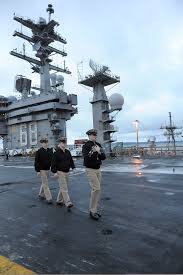 File:U.S. Navy Chief Information Systems Technician Joshua Murphy, Chief  Intelligence Specialist Aaron Poore and Chief Electrician's Mate Andrew  Golembewski prepare to perform morning colors aboard the aircraft  121207-N-HN953-025.jpg