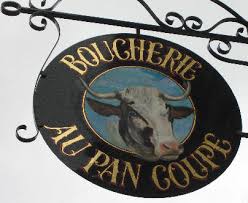 Agencement De Boucherie Au Pan Coupe Enseigne Drapeau Avec Tete De Vache