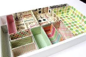 I glued the sides part of the drawer 0.25 away from the edges and then measured the distance between them to make the back part of drawer. Create Your Own Cardboard Box Desk Drawer Organizers Ehow Desk Organization Diy Organized Desk Drawers Craft Room Organization