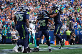 Seahawks roll to 24-3 win over Dolphins as Miami deals with another QB  injury | AP News