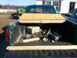 The resulting dividers can be easily pulled out and stored flat in the back of the bed. 11 Diy Truck Tonneau Cover Ideas Truck Tonneau Covers Tonneau Cover Trucks