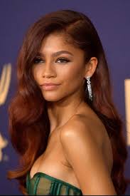 Brown hair with red highlights for a more subtle take on the trend baileydoeshair used a combination of fudge s semipermanent raspberry beret and red corvette to create cherry red highlights on a brown hair base despite the dye being semi permanent it is very long lasting and can be applied on non bleached dark brown hair for a subtle red highlight 25 Best Red Hair Color Ideas From Celebrities In 2020