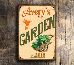Give a gift to your favorite gardener that speaks to what's near and dear to her heart. Personalized Garden Sign Classic Metal Signs