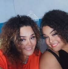 Sister and brother hugging and sister with a big yawn trying to wake up  there names are Romeo and Juliet