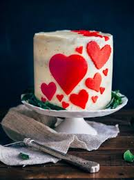 I really didn't know what the right answer to this question was, so i went and the cocoa powder amount used in a red velvet cake isn't as much as say a traditional chocolate cake. Valentine S Day Red Velvet Cake With Marzipan And Ermine Frosting Hummingbird High