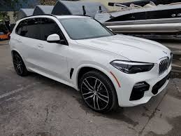 Bmw X5 Ceramic Window Tint Installation By Ultimate Window Tinting In Orlando Bmw Tinted Windows Bmw X5