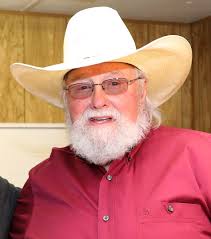 Preacher man talking on tv, puttin' down the rock and roll. Charlie Daniels Wikipedia