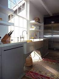 It can be even foldable if the kitchen is tiny, and you can hide it when not needed. Great Solutions For Low Kitchen Windowsills
