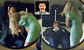 In a bid to resuscitate donald trump's floundering presidential. Rudy Giuliani Tricked Into Compromising Scene In New Borat Film Daily Mail Online