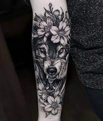 Wolf Tattoo Flower Tattoo Arm Tattoo Wolf Tattoo Sleeve Wolf Tattoo Meaning Sleeve Tattoos