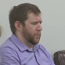 Tennessee teacher who admitted to filming students in locker room cries in  court