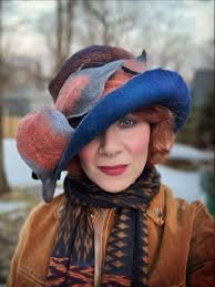 I have 5 popcorn beanies ready to finish this year ! Please go to the  website they are all different, 3 blues 2 pink red. Enjoy and Happy new  year! #weaving