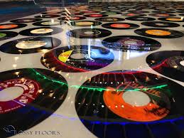 Epoxy Vinyl Record Floor At The Hard Rock Hotel And Casino In Tulsa Ok The Records Are Completely Embedded In Ep Backyard Kitchen Epoxy Floor Hard Rock Hotel