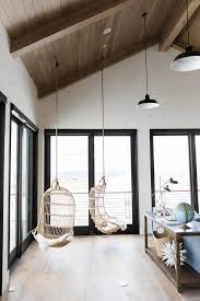 Hold plank up to outlet to make sure cut is in proper place. Living Room With Vaulted Plank Ceiling And Hanging Rattan Chairs Country Living Room Benjamin Moore Simply White