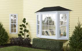 Interior Ideas Wonderful Pictures Of Houses With Bay Windows By White Wooden Frame Glass Windows On The Cream Wall C Bay Window Design Window Design Bay Window