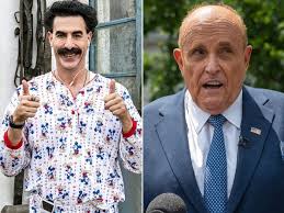 Giuliani has taken to twitter with claims that he was tucking in his shirt at the time. Borat 2 Sacha Baron Cohen Explains Filming Rudy Giuliani Scene