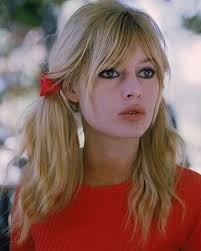 Elle Fanning just borrowed Brigitte Bardot's chicest hairstyle:  https://bit.ly/4k7iLyi