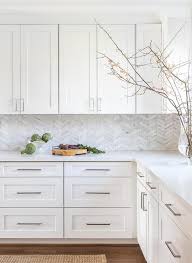 white quartz on white cabinetry