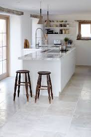 If your subfloor is in good shape, vinyl is also the cheapest because you can usually install it right over the subfloor (or suitable existing flooring), avoiding the expense of new underlayment. Visit Gallery Mandarin Stone Tiles Flooring Grey Tile Kitchen Floor Kitchen Flooring Grey Kitchen Tiles