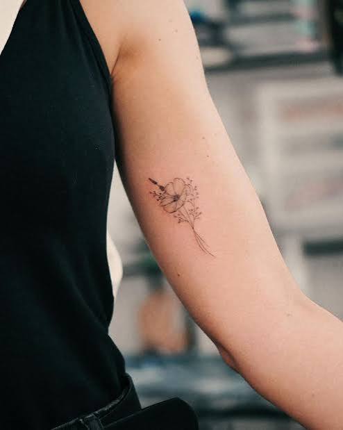 Alina | Fineline Tattoo Artist's Instagram photo: “💐🤍 . Only single needle ✨ . . . . #floralbouquet #minitattoo #wildflowers #wildflowerbouquet #tinytattoo #singleneedle #hannover…”