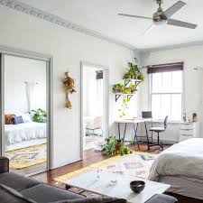 Our home office/guest bedroom — black & blooms. How To Create A Tiny Office Space In Your Bedroom For Working From Home Apartment Therapy