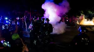 One of the rioters dropped. Riot Declared Dozens Arrested In Portland Seattle Chicago Protests