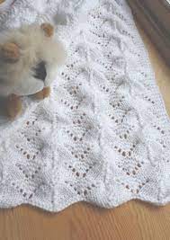 Caron x pantone smooth stripes knit shawl skill level: Reversible Lace Baby Blanket Lace Baby Blanket Baby Blanket Knitting Pattern Blanket Knitting Patterns