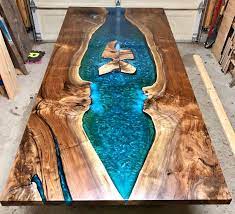 The epoxy river was customized to match the color of the cabinets. Custom Epoxy Resin River Dining Table Etsy