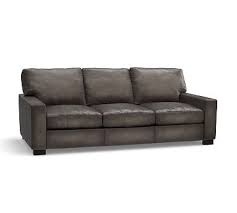 I've been looking at the pottery barn irving leather armchair with nail heads for some time now. Turner Square Arm Leather Sofa 85 5 Down Blend Wrapped Cushions Burnished Wolf Gray Pottery Barn