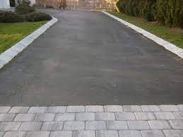 Belgian block are extremely large rectangular or sometimes cubical shaped pieces of stone can be the term belgian block may have some historical connection to when european ships set sail from. Belgian Block And Pavers Dressing Up An Asphalt Driveway All About The House