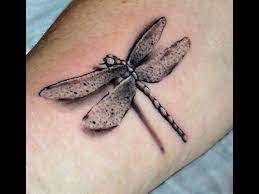 Dreamcatchers are pervasive in native american culture, and can be found in many parts of the… Dragonfly 3d Realistic Tattoo Body Artist Dragonfly Tattoo Tattoos Fish Tattoos