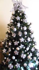 Upcycled Plastic Bottle Bottoms Into Stars For Christmas Tree Decoration Recyclart Christmas Tree Decorations Items Christmas Tree Crafts Christmas Tree Decorations