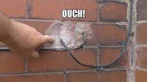 I have 'chased' a cable down from a back box through about an inch of plaster and want to cover it some metal trunking (my word) but don't know the best way to sticking to the brick wall. Drilling Through Brickwork For Wires Youtube