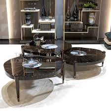 Ash solids and quartered white oak veneersinset round mirrored glass in center with stainless steel gallery. Luxury Marble Coffee Table Cluster Taylor Llorente Furniture