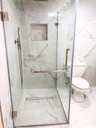 • large format tile must be installed on a level substrate. Tile Pattern For Shower Base Using Large Porcelain Format Home Improvement Stack Exchange