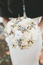 The wire beaded flower bouquet that i made for my wedding. A Glam White And Gold Winter Wedding By Onelove Photography Wedpics Blog Winter Wedding Bouquet Flower Bouquet Wedding Winter Wedding Flowers