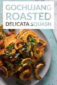 Gochujang Roasted Delicata Squash A Korean Inspired Winter Squash Dish With Sesame Oil Soy Sauce And A Shower Of Delicata Squash Pear Recipes Squash Recipes