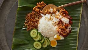 Berbekalkan sebungkus nasi lemak dgn selonggok ikan bilis secubit sambal dan seketol ayam cukup membuatkan aku tersenyum pagi ini. On Hawker Nasi Lemak Appetite
